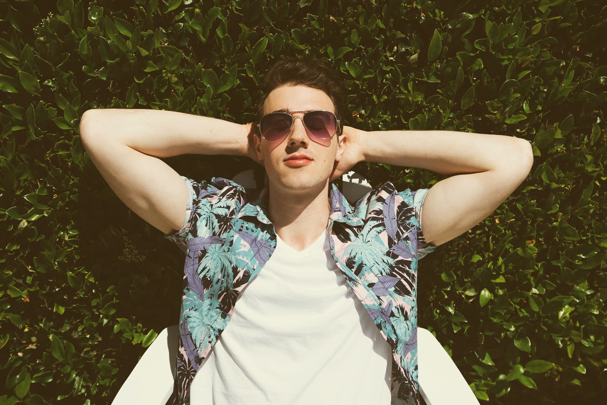 I was instantly hooked on Zyles after listening to his song “Sundresses” the song is shimmering pop at its finest and is perfect for those late summer hangs. We chatted with Zyles about his latest inspirations.