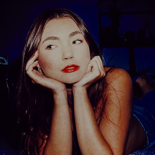 Georgia VanNewkirk's "Blue Velvet" is a luscious dream of a song and it's only fitting the the video matched. It's about being vulnerable and diving into your emotions. The video shows her drifting through hazy visions: a church and a park, like going through her memories. We talked to her about