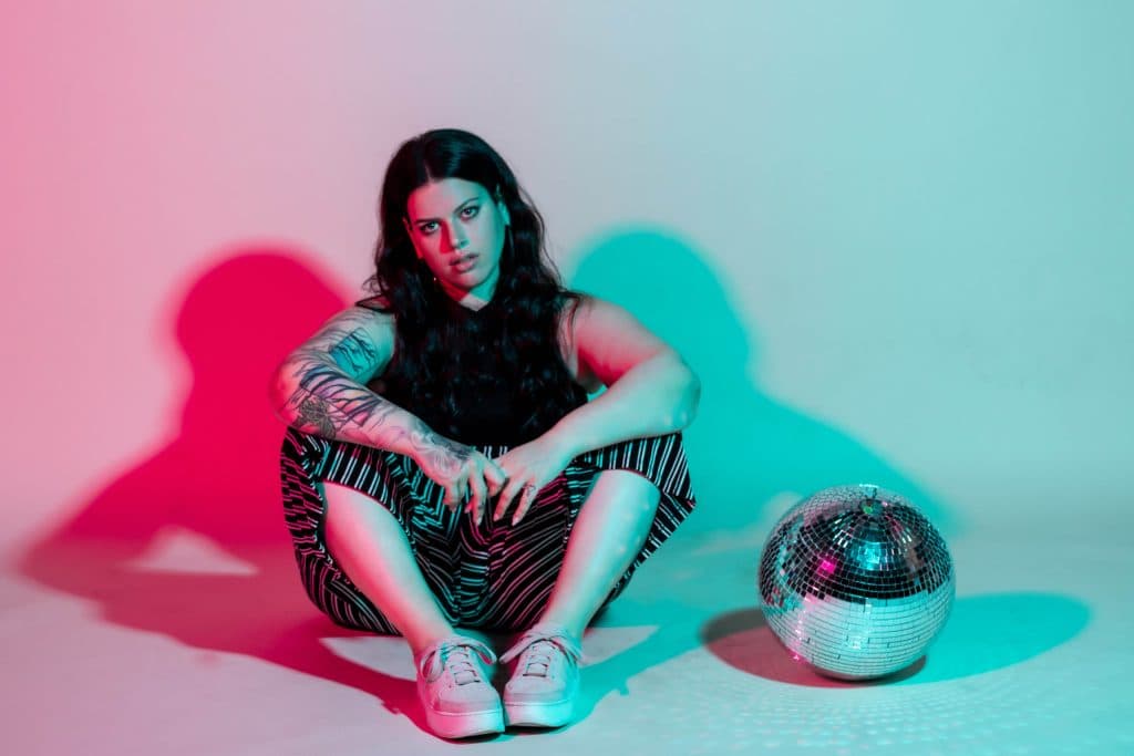 Jackie Lipson is unstoppable and a true force. She gets real with us in her single, “Bully,” which is basically about living in her own head. She has struggled with anxiety and depression since she was a kid. Her journey to self-acceptance was not easy. She’s only used this love to embrace