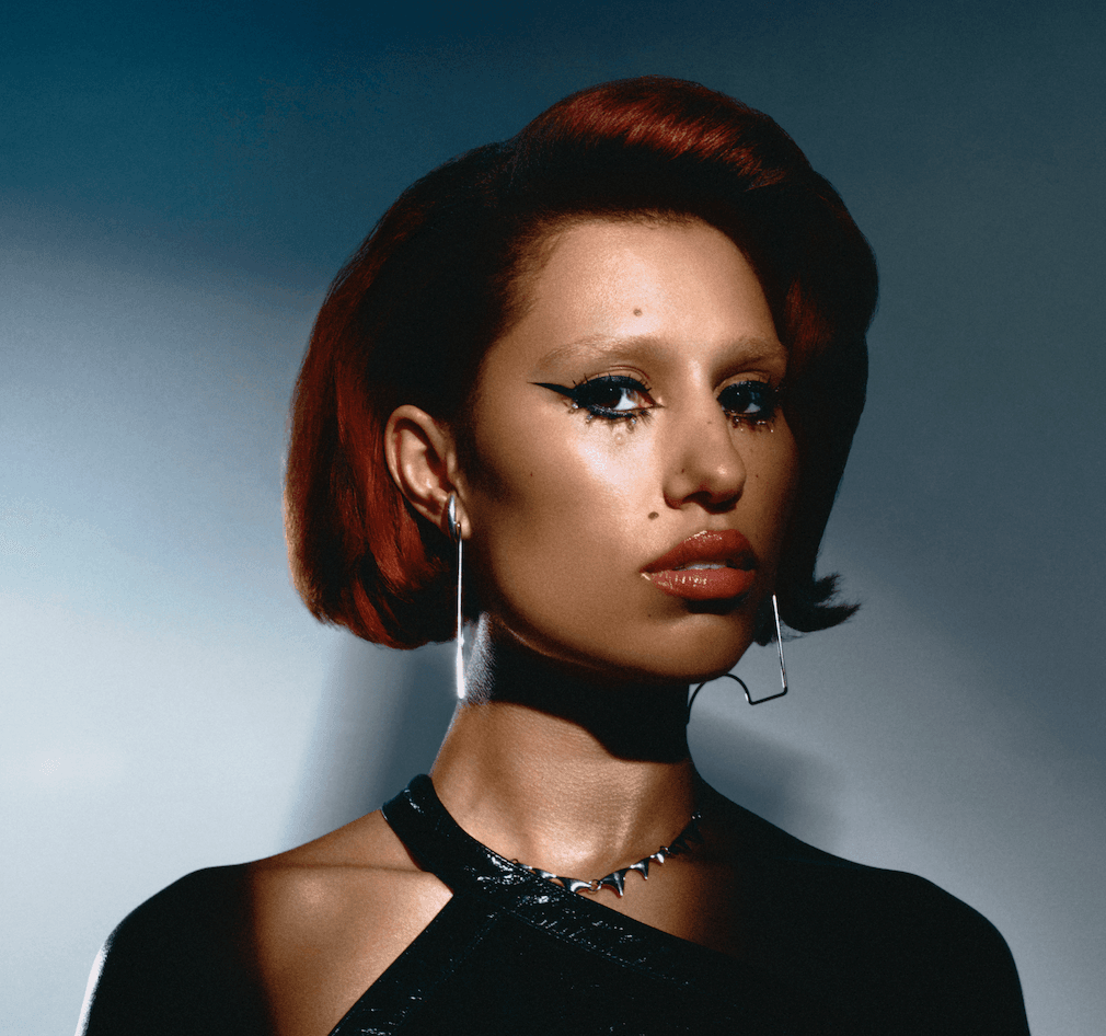 Pop artist RAYE makes her return to music with brazen new single, “Hard Out Here.” The accompanying music video showcases the artist’s one-of-a-kind style equipped with elaborate outfits, wigs, and dances. Flashy visuals aside, the track’s lyricism is an emotionally charged metaphorical middle