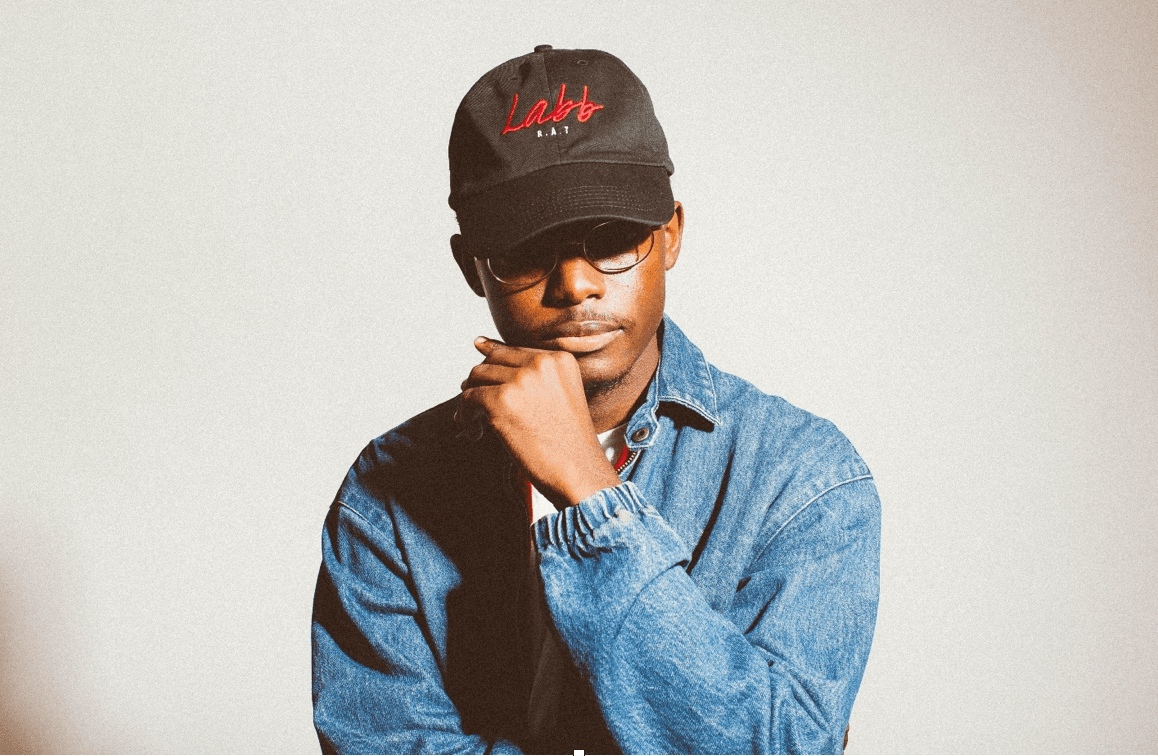 Over 4,000 miles away from his home in New York, Darius Henry- AKA HDBeenDope- is about to take the stage after preparing for a 15 minute set. He sits in a hookah lounge and awaits his performance time. The slot keeps getting pushed back and he waits with anticipation. Suddenly, the promoter for
