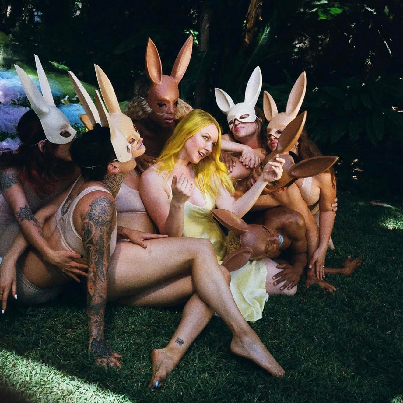 Being in a music video is something I never thought I would do, but when Mae Deline asked me to be in her bunny-themed video I said “yes” but I wasn’t super excited. I’ve never been 100% confident about my body and like most people, was hella nervous to be on camera half-naked. When I arrived on