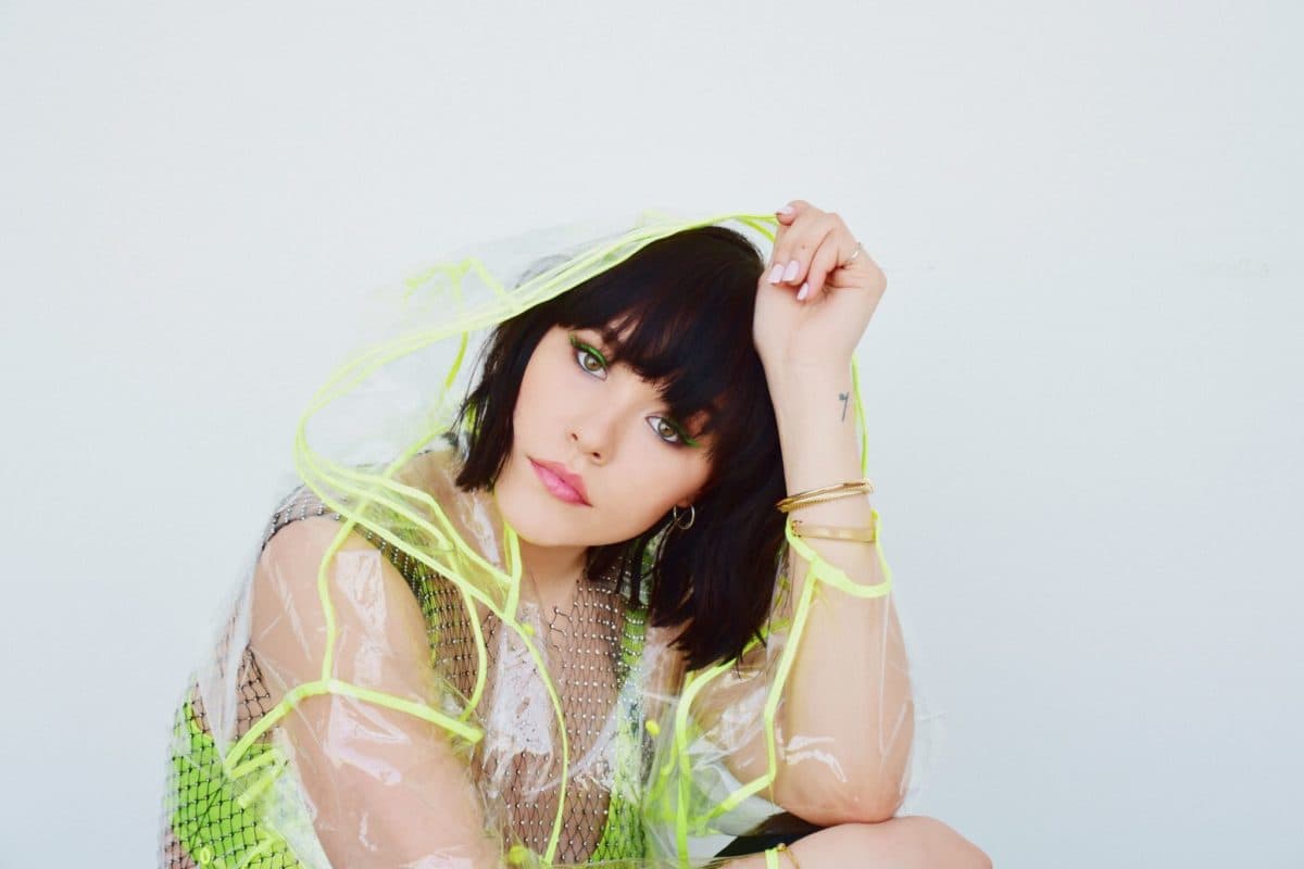 We’ve been obsessed with UPSAHL’s unique songs and whole vibe. Her new vignettes are just gorgeous and we’re so excited to premiere one of our faves for her song “Drugs.” We also talked to her about her new music and upcoming tours. First of all, tell me about your new song, “Wish You’d Make Me