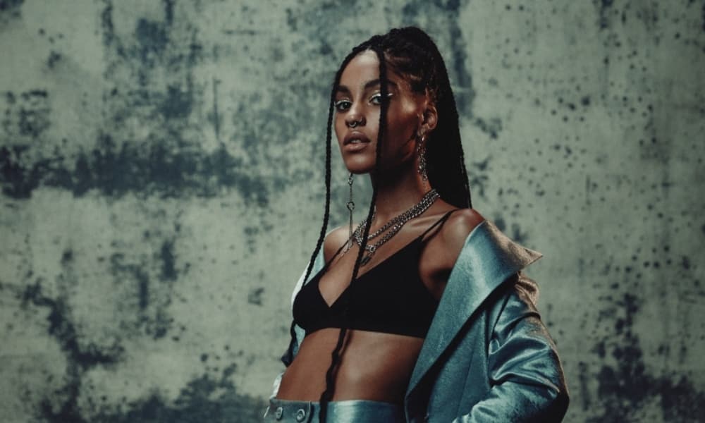 ABISHA is exactly what we need in music right now. She’s a musician, writer, and she works with fashion. She’s also striving to be a role model for gay women of color and be the representation she never got to see growing up. We’re already obsessed with her and we can’t wait to see what she does
