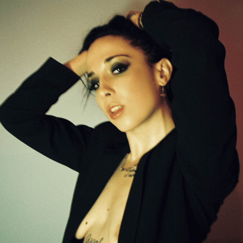 I first met Sizzy Rocket at one of her tour stops in Dallas, TX about three years ago. Her control over the crowd was awe-inspiring. She has this contagious energy on stage that has the crowd going from thrashing in a mosh pit to breaking down into tears during a soft piano ballad. Her cult is