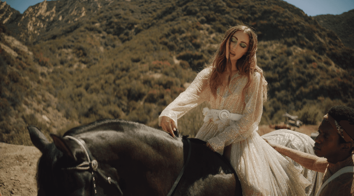 Jazzie is an LA-based indie-pop artist and the 26-year-old daughter of Jessie Colin Young, lead singer of The Youngbloods, known for their iconic 60’s anthem,” “Get Together.” She’s been writing music all of her life, but she just started releasing her own material last year. Jazzie wrote the